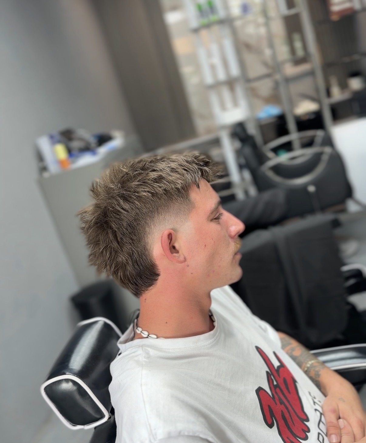 Skin fade haircut by Triple Line Barbershop